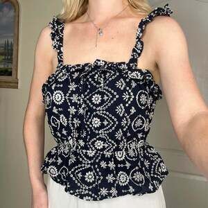 MINE Floral Embroidered Ruffle Peplum Top